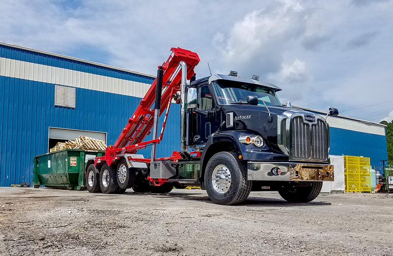 Illustration for article titled Freightliner and Autocar are Fighting for The Soul of the American Sanitation Engineer